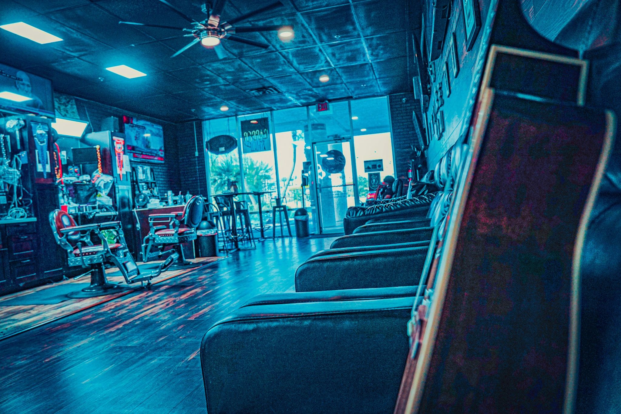The lounge in moody teal light